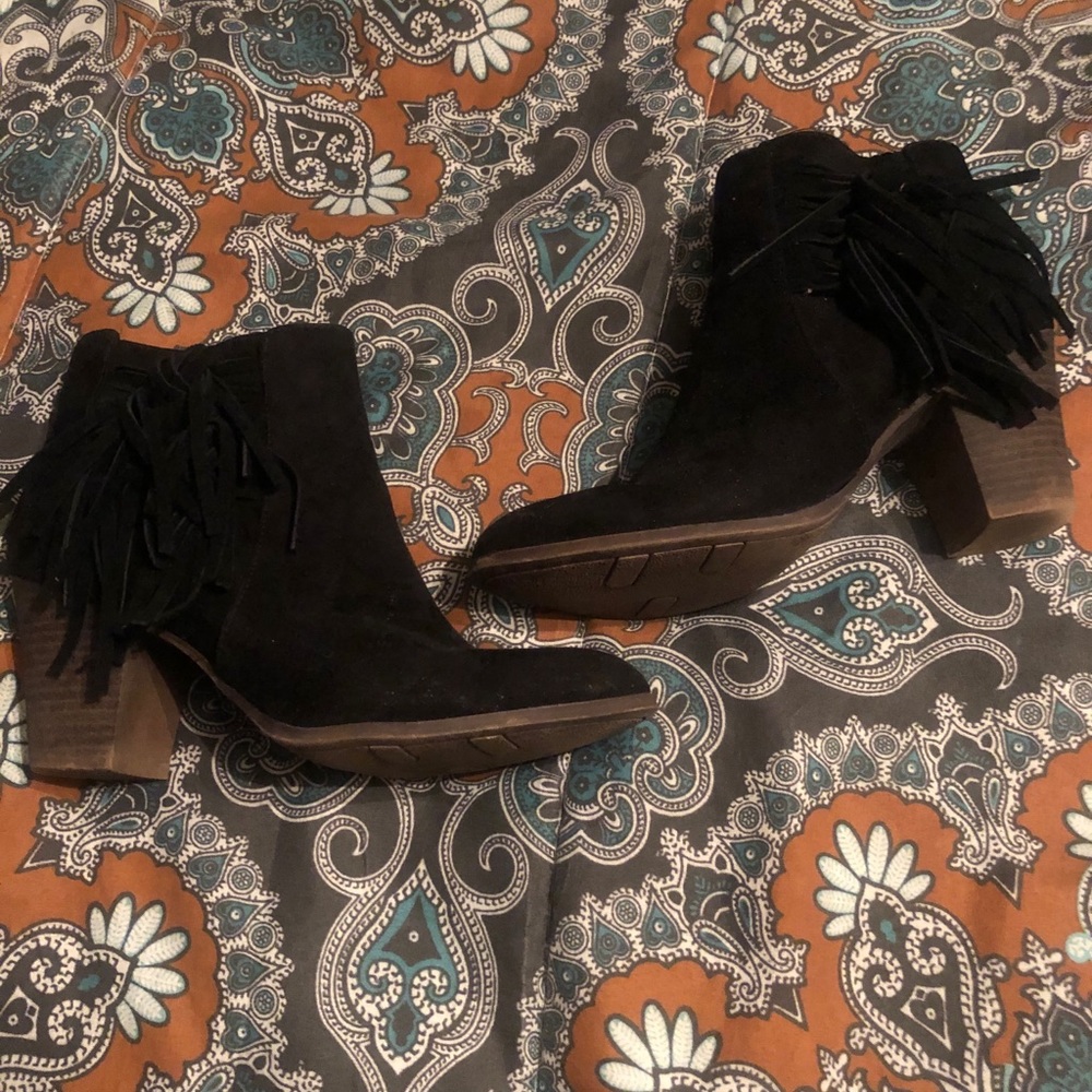 Tasseled black booties by Fergalicious. size 8.
